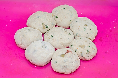 Separate the dough into 8 pieces and roll into nice balls