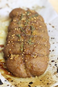 Evenly apply the marinade onto the Seitan before placing it in the oven.