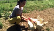 Paige with some of the inhabitants of the Piedmont Farm Animal Refuge. Image: courtesy of Paige Dixon.